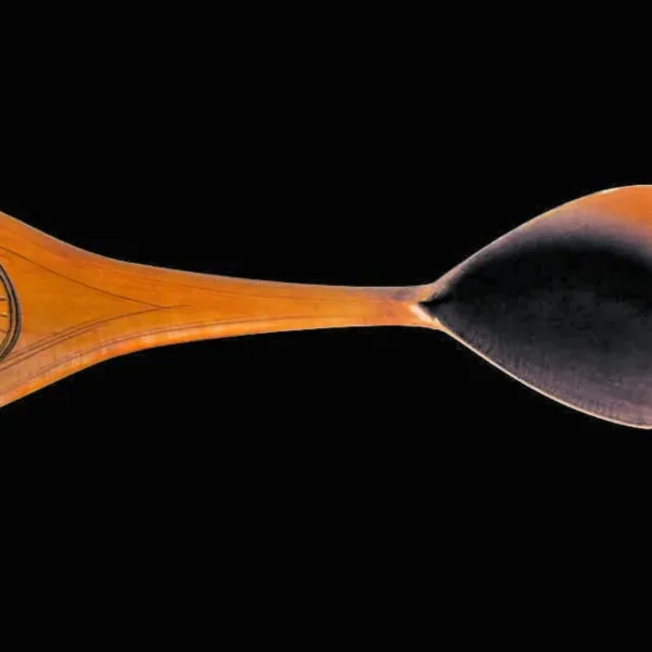 Effige di Donna Sole sul manico del cucchiaio